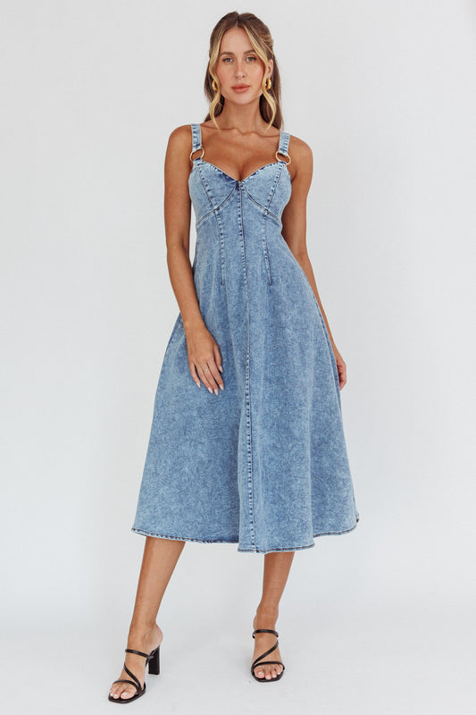 Autumn Breeze Denim Midi Dress in denim blue with sleeveless V neckline and open back, perfect for fall occasions.