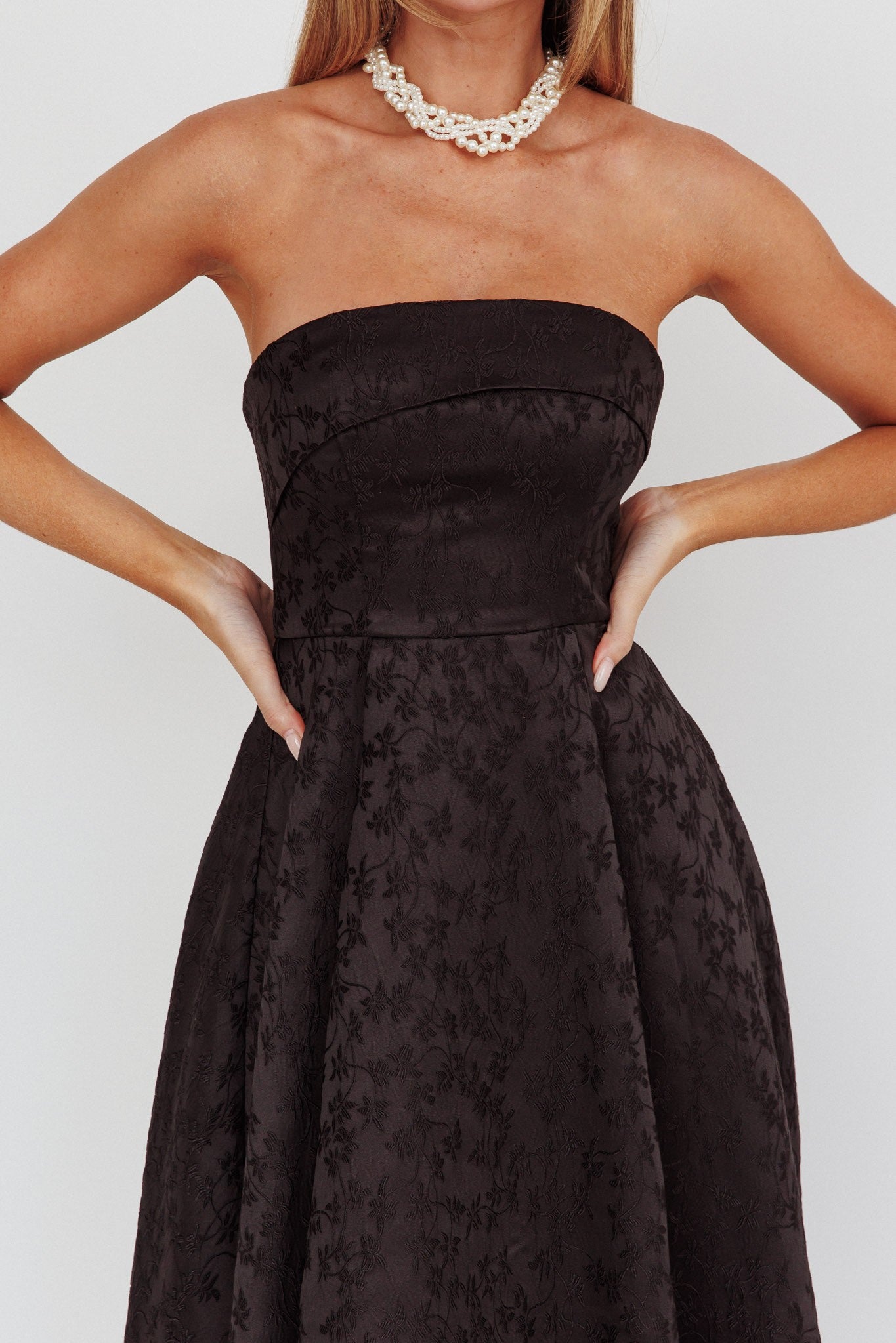 Black Diamond Jacquard Midi Dress in black with floral print and open back, perfect for elegant occasions