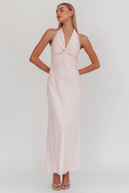 Halter neck front twist maxi dress in pink with open back and bow tie.