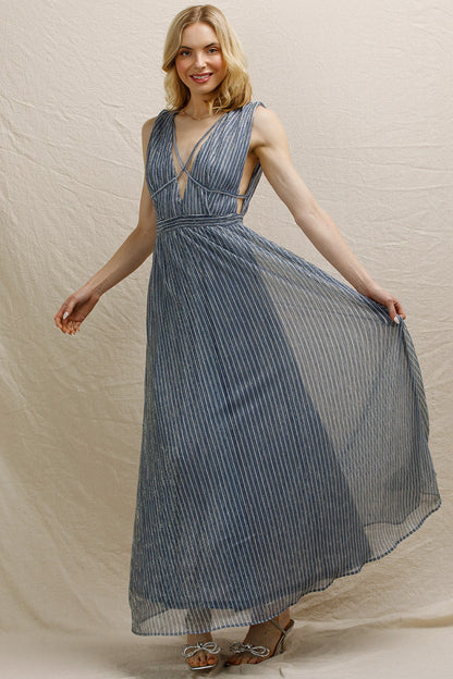 Strappy V-neck shimmery maxi dress in blue-silver, perfect for holiday parties, New Year's Eve, and formal occasions.