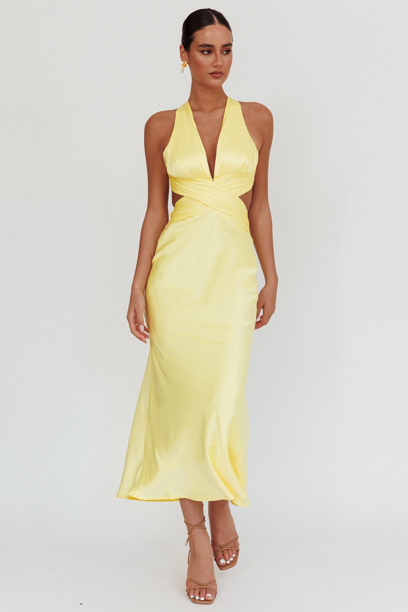 Luminous Dawn Wrap Maxi Dress in lemon, featuring a draped wrap design, V neckline, side cutouts, and a crisscross back.