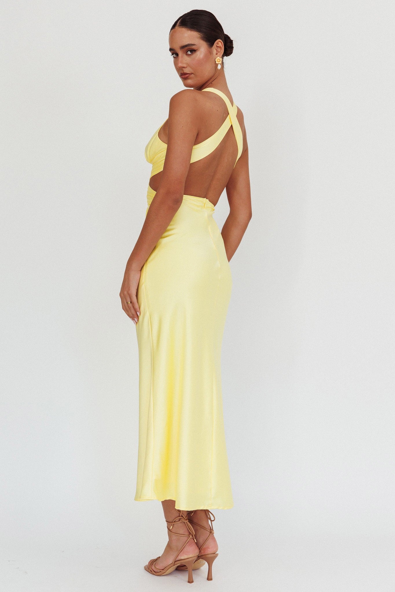 Luminous Dawn Wrap Maxi Dress in lemon, featuring a draped wrap design, V neckline, side cutouts, and a crisscross back.