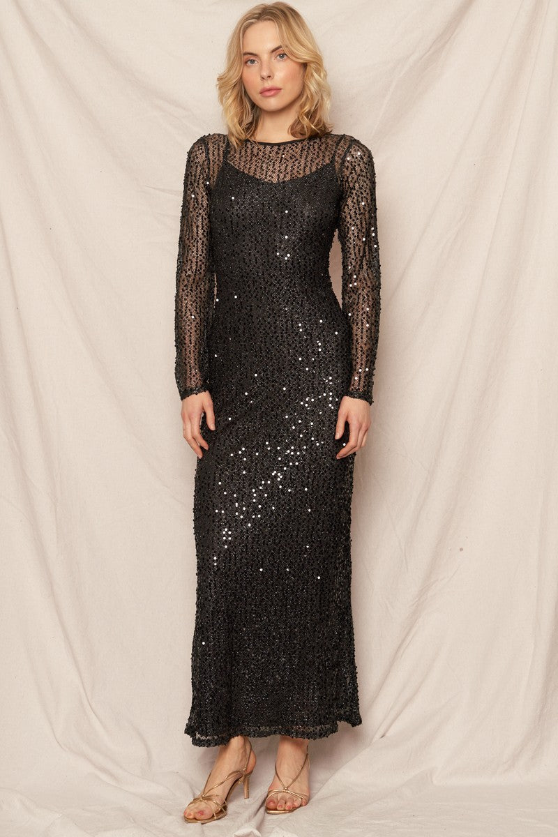 Black sequin maxi dress with elegant bell sleeves, perfect for New Year's celebrations and glamorous events.