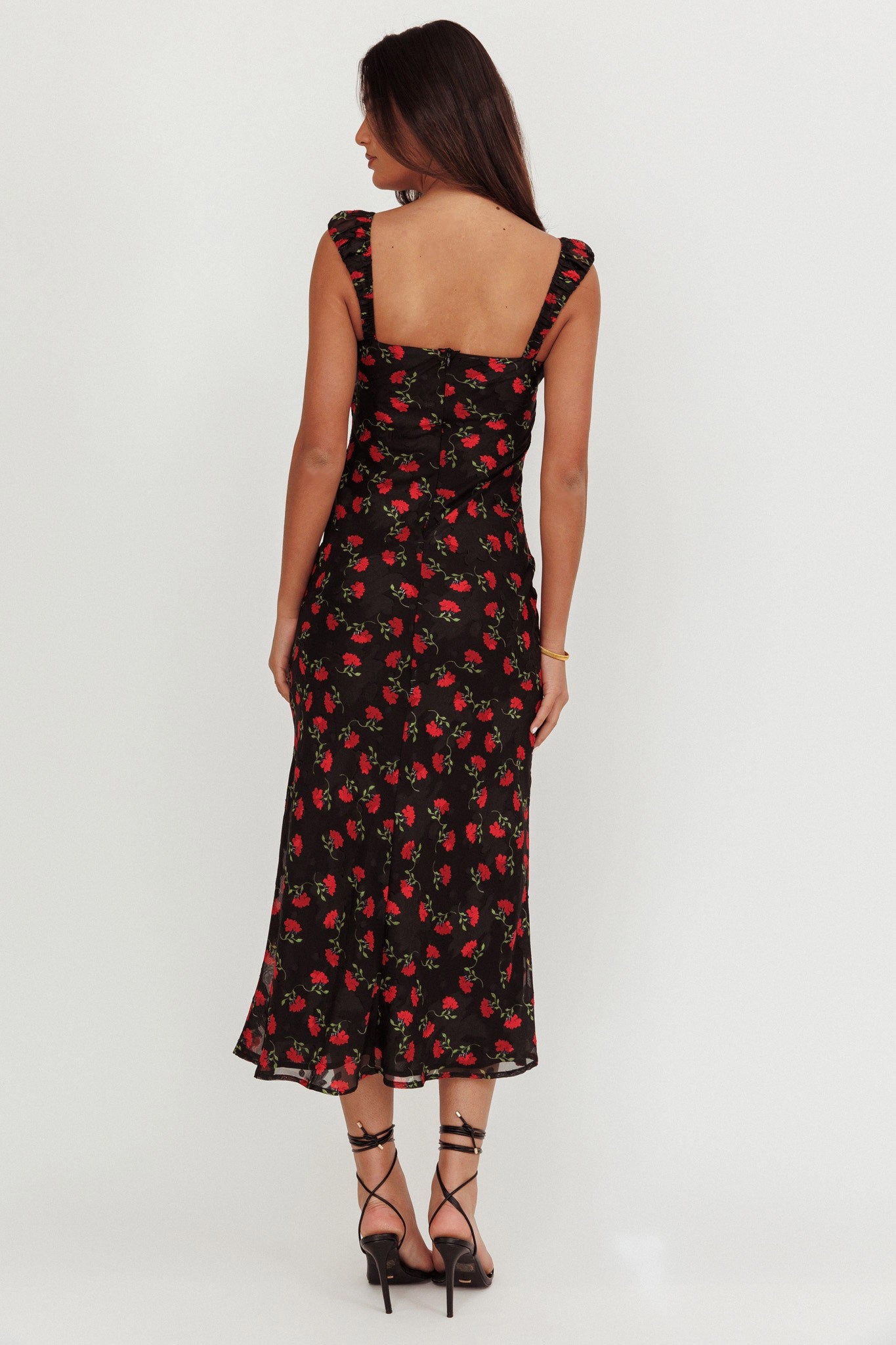 Nocturnal Blossom Maxi Dress in black with red floral design, featuring elasticated straps and a front tie.