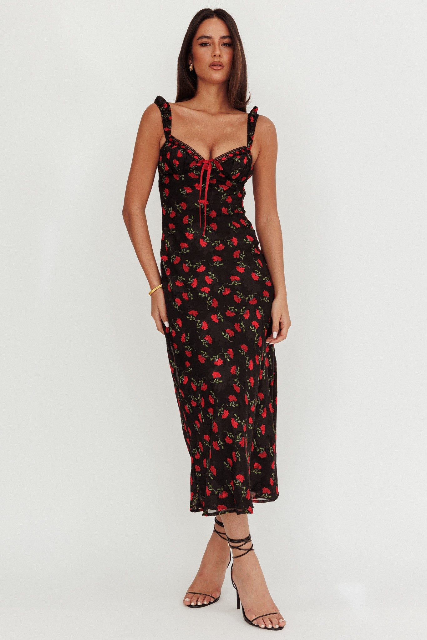 Nocturnal Blossom Maxi Dress in black with red floral design, featuring elasticated straps and a front tie.