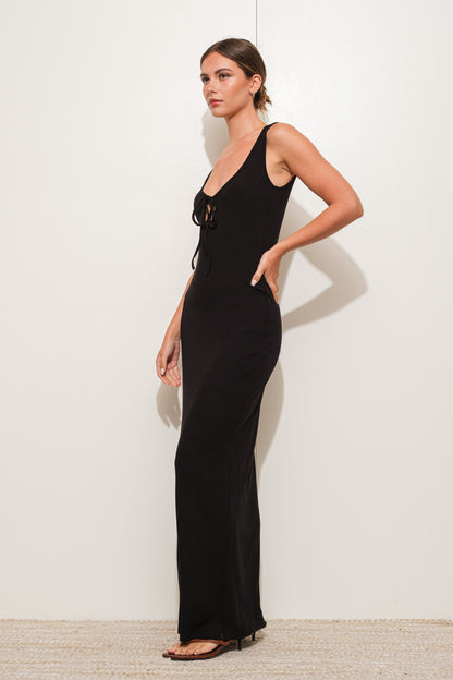 Onyx Peekaboo Ribbed Knit Maxi Dress in black with a peekaboo tie detail, perfect for fall.